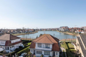 Penthouse with 2 very large terraces south facing overlooking ZEGEMEER, prime location, near the sea, 2 bedrooms, free garage